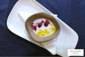 Vanilla Cream flavored with coconut, mango sauce and caramelized almonds at Avocado in Crete