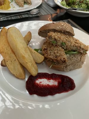 Vegetable burger with beet and chips  at Avocado in Crete