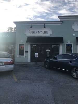 The entrance  at Fork My Life in Sarasota