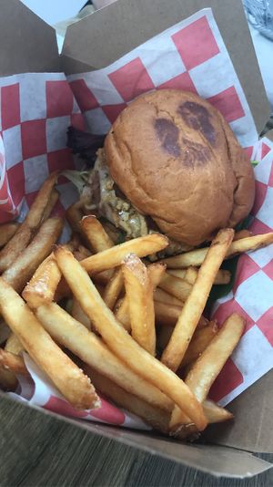 BBQ burger comes with fries and cole slaw  at Fork My Life in Sarasota