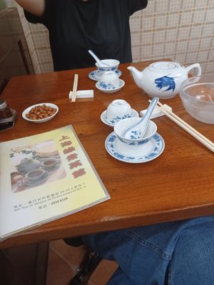 Chinese menu and tea to clean the dishes before eating at Shanghai Yuen Vegetarian in Macau