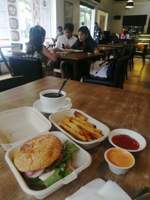 falafel burger and fries with coffee at Planted - Cloud Kitchen in Metro Manila