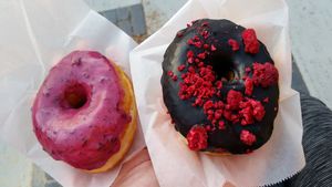 Malted blueberry and Black onyx raspberry vegan doughnuts at Pepperbox Doughnuts - Design Center  in Charlotte