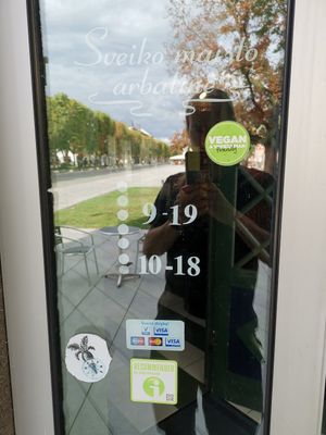 Working time at the entrance door at Vilties Vaistinės Arbatine in Kaunas