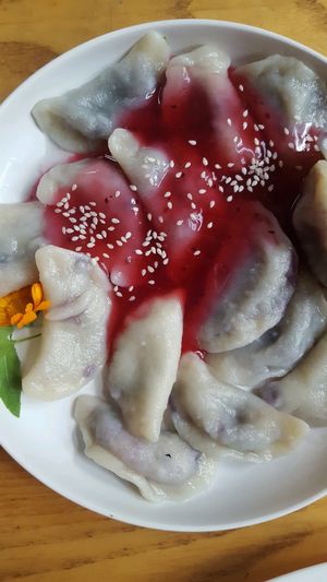 Dumplings with berries at Vilties Vaistinės Arbatine in Kaunas