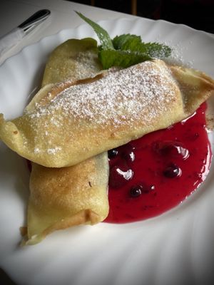Banana cinnamon crepes and berries sauce. Berry yummy!  at Vilties Vaistinės Arbatine in Kaunas