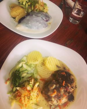 Mushroom steak and beat root burger  at Vilties Vaistinės Arbatine in Kaunas