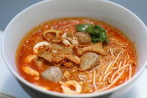 Nyonya laksa made with curry mix, coconut milk, vegetarian sambal chili sauce at E-PACS Vegan Cafe in East Tamaki