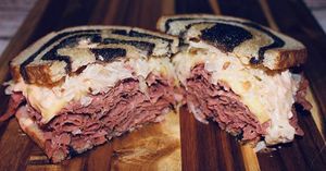 Reuben
Marbled rye bread filled with homemade thinly sliced corned beaf, provolone cheese, sauerkraut and house made thousand island dressing at Seitan's Realm in Columbus