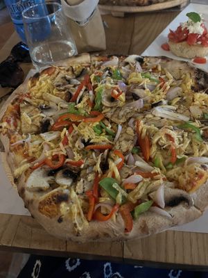 Vegetable pizza with vegan cheese   at Il Gusto - Maybe closed in Planos