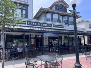 The front entrance + outdoor seating area   at Cafe Madison in Albany