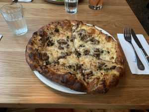 Kale, mushroom and caramelised onion pizza   at Earls Kitchen + Bar - Robson in Vancouver