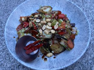 Kung pao veggies with brown rice & chiles on the side  at Earls Kitchen + Bar - Robson in Vancouver