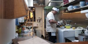 View of the kitchen at Menkui Kinya in Kyoto