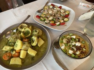 Artichokes with lemon sauce, baby zucchini with vegan mayo and truffle, yellow lentils  at Amaltheia in Katerini