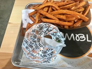 Burger and a side of sweet potato fries  at HUMBL in Orlando