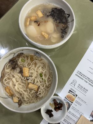 Both yum. Rice cake soup and hot noodles  at Mananim Recipe in Seoul