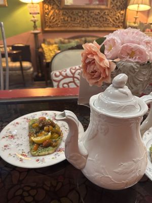 Green tea and a half order of avocado 🥑 toast   at The Modern Rose in Deerfield Beach