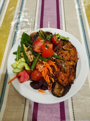 £12.80. Stuffed aubergine with all of the salads. at V Café at the Institute in Guildford
