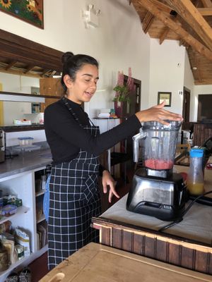 Keshani making a smoothie with the Vitamix. at Bistro Pointe Taylor in New Richmond