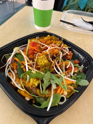 Curried tofu Healthy Bowl over sweet potato. Really, really delicious! at BWI - Nalley Fresh - TA in Baltimore