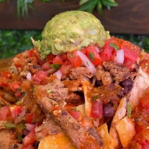 Pollo Nachos with Guacamole  at Sugar Taco in Los Angeles