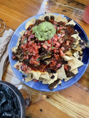 Carne Asada Nachos with Guacamole  at Sugar Taco in Los Angeles