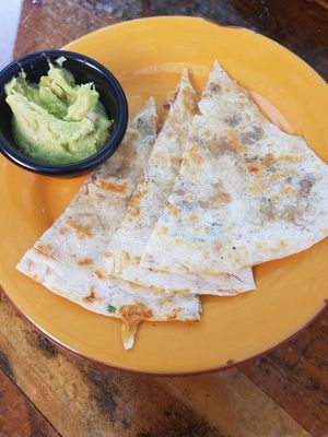 Quesadilla with a side of Guacamole at Sugar Taco in Los Angeles