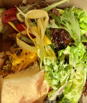 This is their vegan garden burger. Photo doesn’t do it justice but took it in a to-go box in the car. So fresh & delicious !  at The Wild Plum Cafe in Monterey