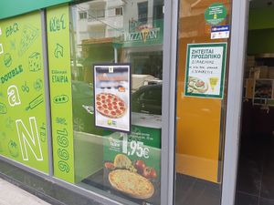 window at Pizza Fan in Crete