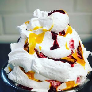 Katchis legendary Sticky Coco: Coconut ice cream with sticky rice, raspberry coulis and mango ragout.  at Katchi Ice Cream - Savignyplatz in Berlin