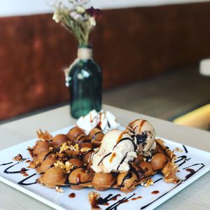 Katchi Bubble Waffle with 2 scoops of ice cream, 2 toppings and Choc Fudge served inhouse (less waste more taste😉). at Katchi Ice Cream - Savignyplatz in Berlin