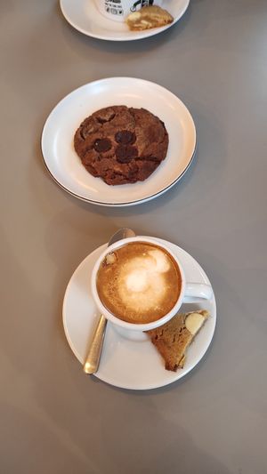 Cortado with oat milk and vegan chocolate cookie 🍪 at Emilie and the Cool Kids in Reykjavik