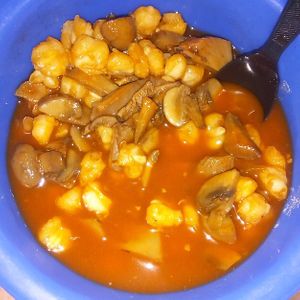 Pozole without garnish at Cien 100% Naturalisimo in Berwyn