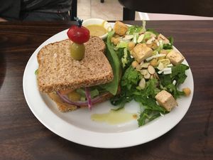Side of Caesar salad. Not sure name of sandwich. at Cien 100% Naturalisimo in Berwyn