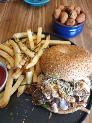 Philly Cheesesteak Bagel $25.00; Spicy Chikun Popcorn $10.00 at Argi in Kensington