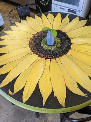 Cute table inside at Nature's Corner Cafe in West Palm Beach