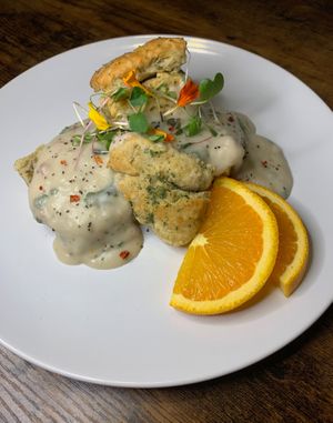 Herbed Buttermilk Biscuits with Country Gravy  at Life on Mars in Seattle