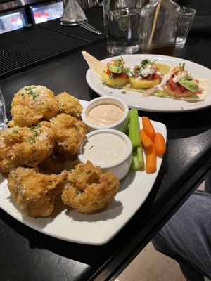 Garlic-butter parm wings   at Life on Mars in Seattle
