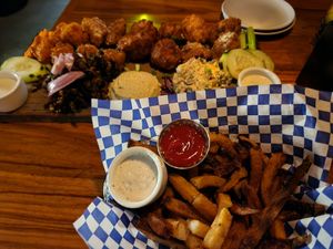 Fries, Mars platter in the background at Life on Mars in Seattle