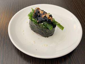 Caviar and algae salad sushi roll  at Tiger Club Vegan Sushi in Berlin