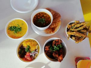 dal, chickpea & spinach curry with puri, bhajis, okra fries, potato and mushy pea cake at Bundobust in Liverpool