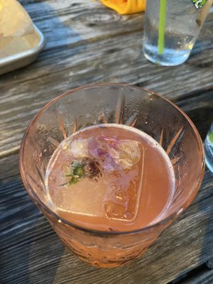 Delicious mezcal specialty cocktail with the fancy ice cube at Crust Kitchen and Cocktails in Wilmington