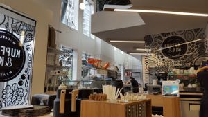 Inside the restaurant at Kupfert & Kim - Yorkville in Toronto