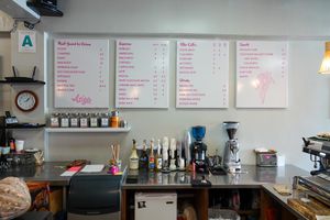 Menu and coffee setup at Asiga in Guam