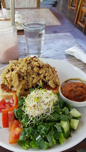 The Kale Wrap with Tempeh and mushrooms, but without the wrap and sourdough bread instead at Eat.Co in Ubud