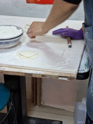 Dumpling skins being prepared. at Lái Xīn SùShí 來欣素食手工水餃 in Taipei