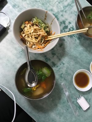 Spicy noodles and soup recommended by owner. Delicious ! at Lái Xīn SùShí 來欣素食手工水餃 in Taipei