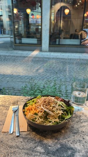 Bowl with vegan mince, Brokkoli, corn, Sprouts, Glas Noodels, salad, peanuts, pickled onions   at Holy Greens in Gothenburg