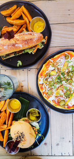 Falafel Sandwich, Lentil Burger and Pizza with Soya, Pineapple and Jalapeños. at Vegan Town in Ajijic